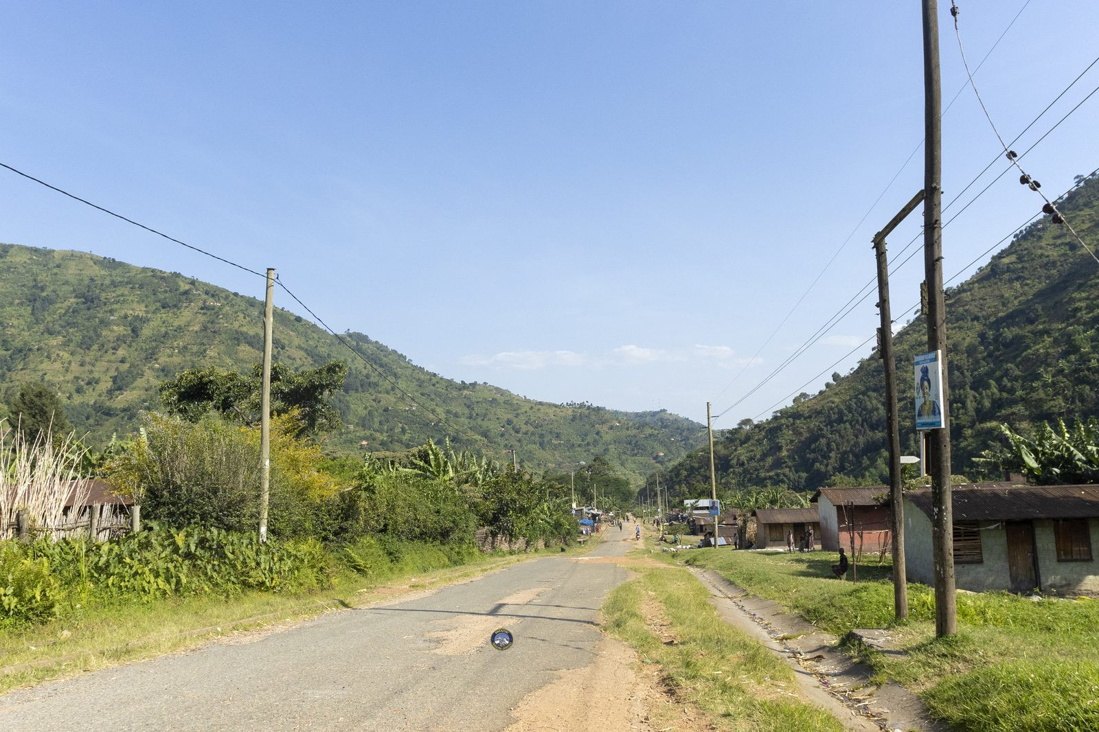 Village road leading toward the Rwenzori foothills